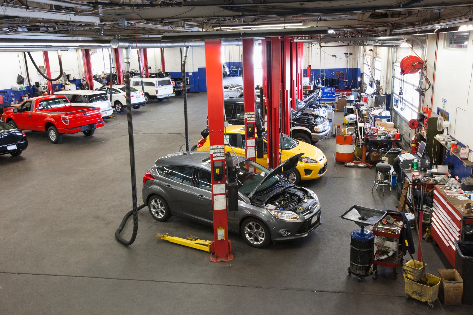 rows-of-cars-and-trucks-in-auto-repair-shop-1.jpg rows-of-cars-and-trucks-in-auto-repair-shop-1.jpg